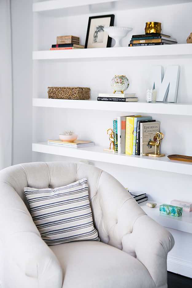 Floating shelves are a great option | Apartment Living Room Ideas: Renter-Friendly Design Inspiration