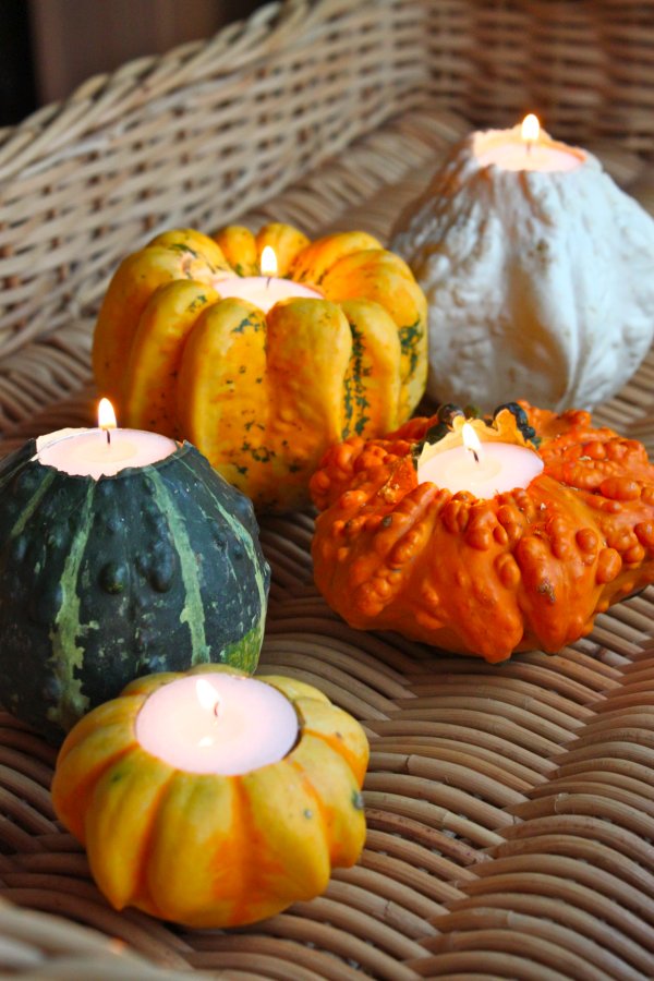 Pumpkin Candle Holders | 13 Awesome Decorating Ideas To FALL For! | http://livingroomideas.com/13-awesome-decorating-ideas-to-fall-for/