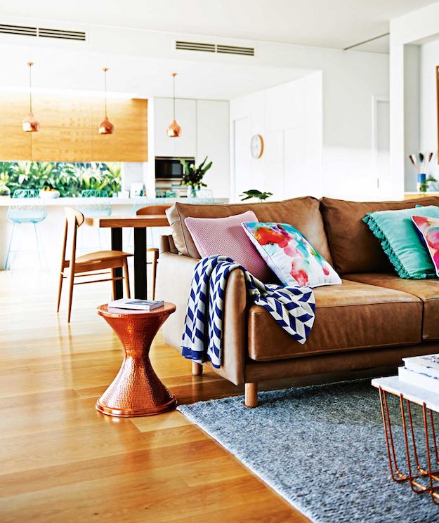 Colorful Accents | Chic Ways To Style A Brown Sofa In Your Living Room