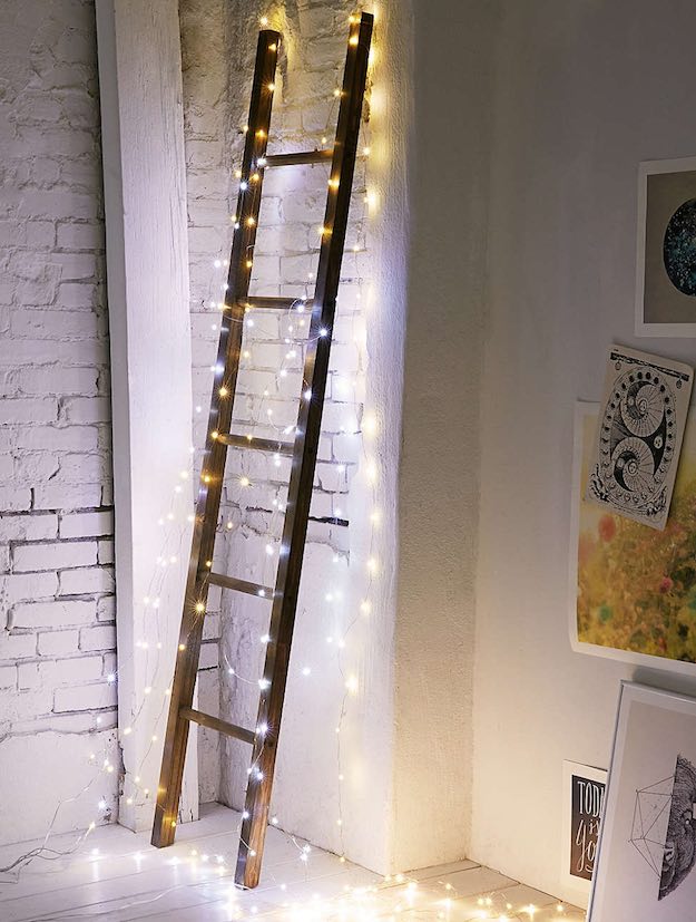 On your ladder blanket | Creative Ways To Use Christmas Lights All Year 'Round